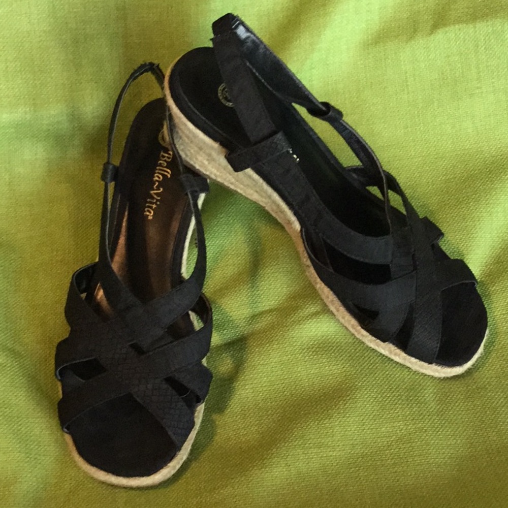 Women’s black wedge sandals size 8 1/2 wide.